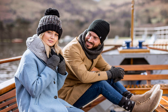 Couple wearing Heat Holders® thermal accessories