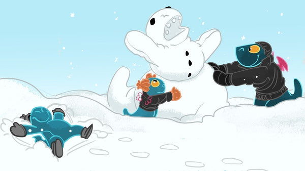 Toestie the Dragon makes a snow dragon with his niece and nephew.