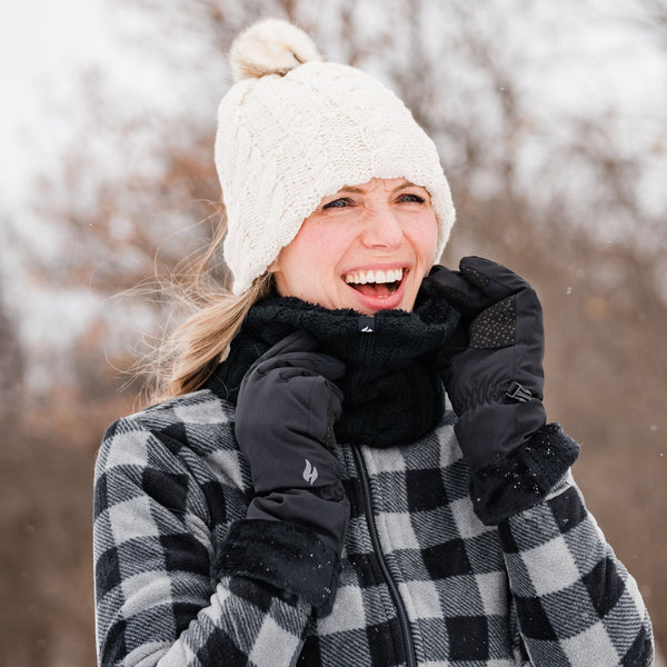 Woman wearing Heat Holders® thermal hat, gloves, neck warmer and jacket
