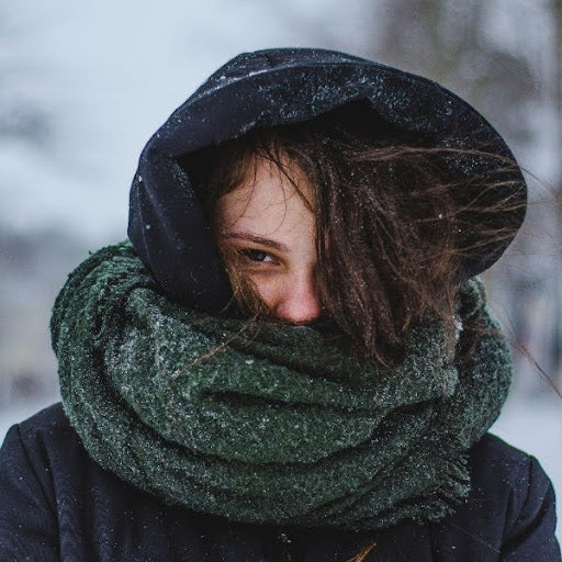A woman wrapped in muffler