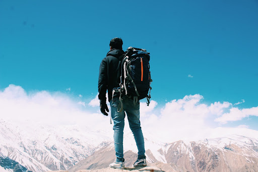 Man standing on snow-covered mountain