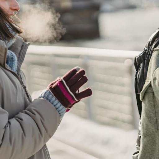 Person wearing gloves.